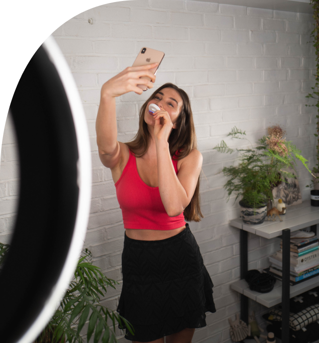 photo of woman taking selfie